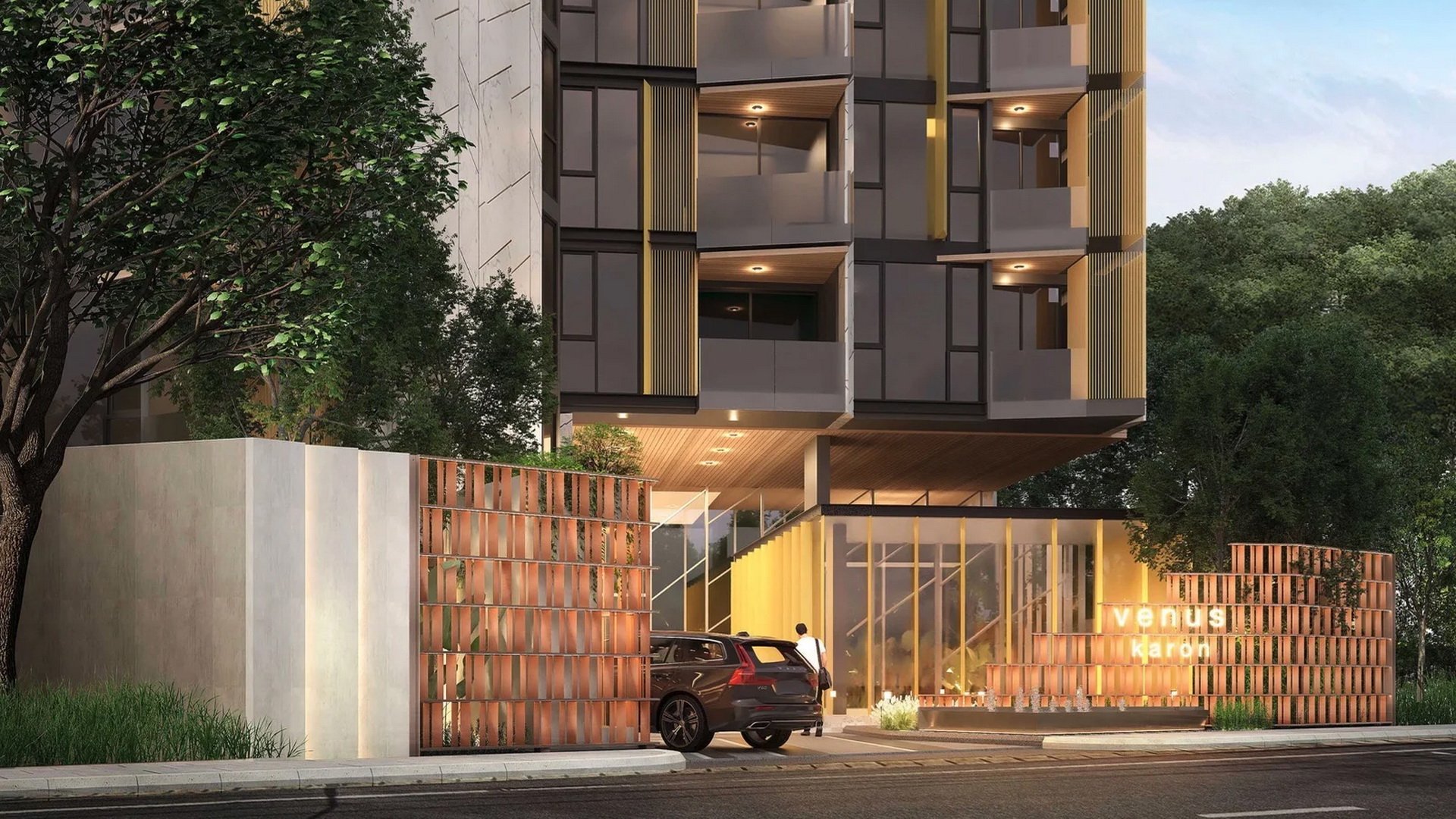 VIP Venus Karon — вход и навес у лобби в вечернем освещении